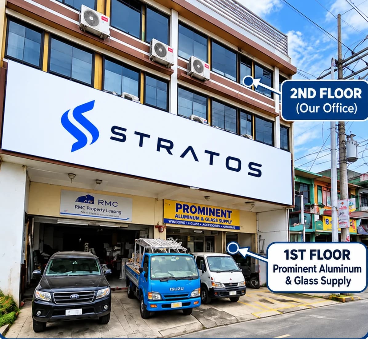The STRATOS office building on Diversion Road, Imus City: STRATOS signage above the ground floor, with the 2nd floor (our office) and 1st floor (Prominent Aluminum & Glass Supply) marked